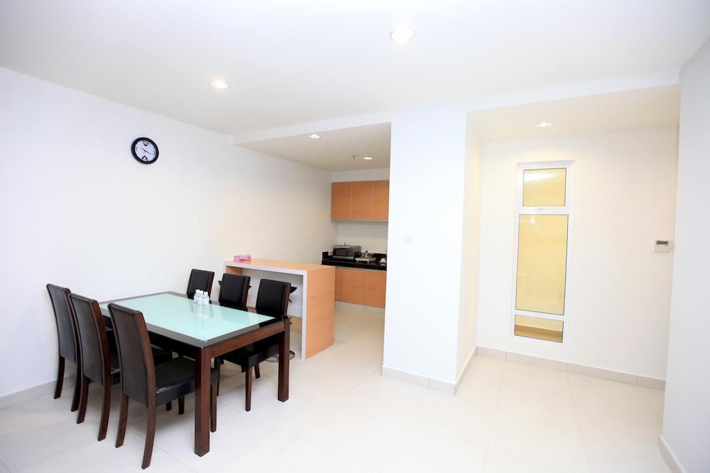 Merdeka Suites Hotel Miri Pokoj fotografie
