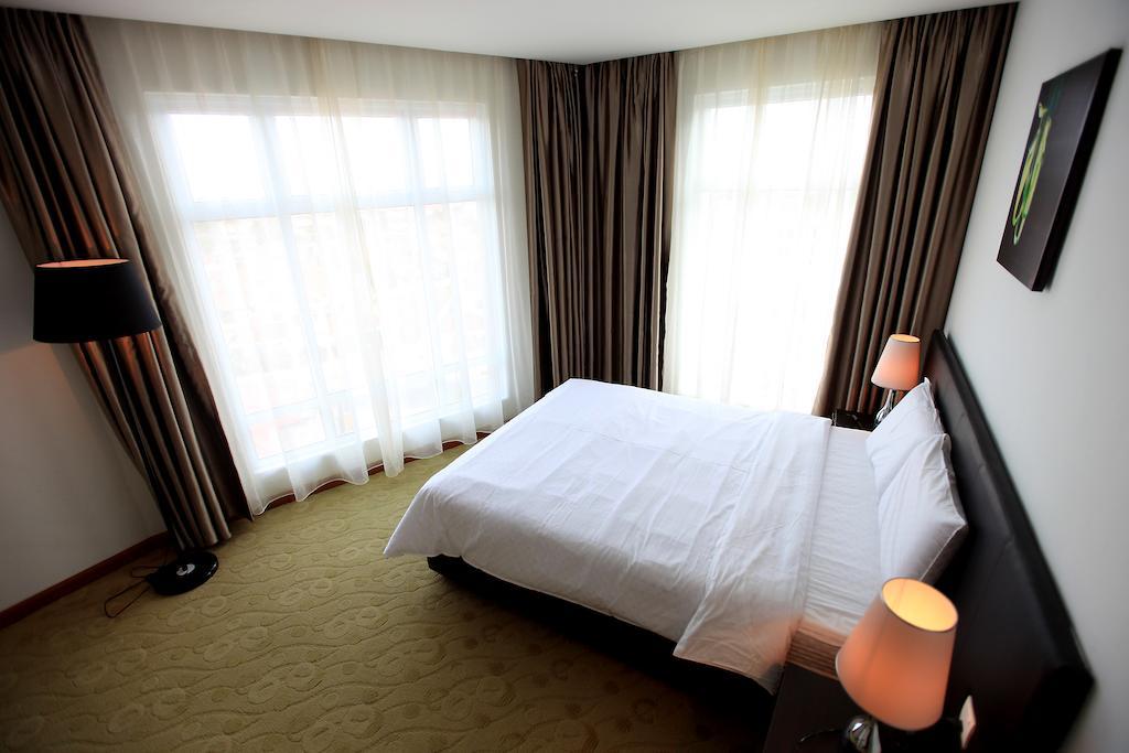 Merdeka Suites Hotel Miri Pokoj fotografie
