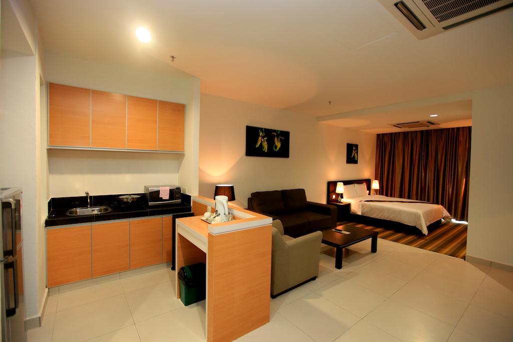 Merdeka Suites Hotel Miri Pokoj fotografie